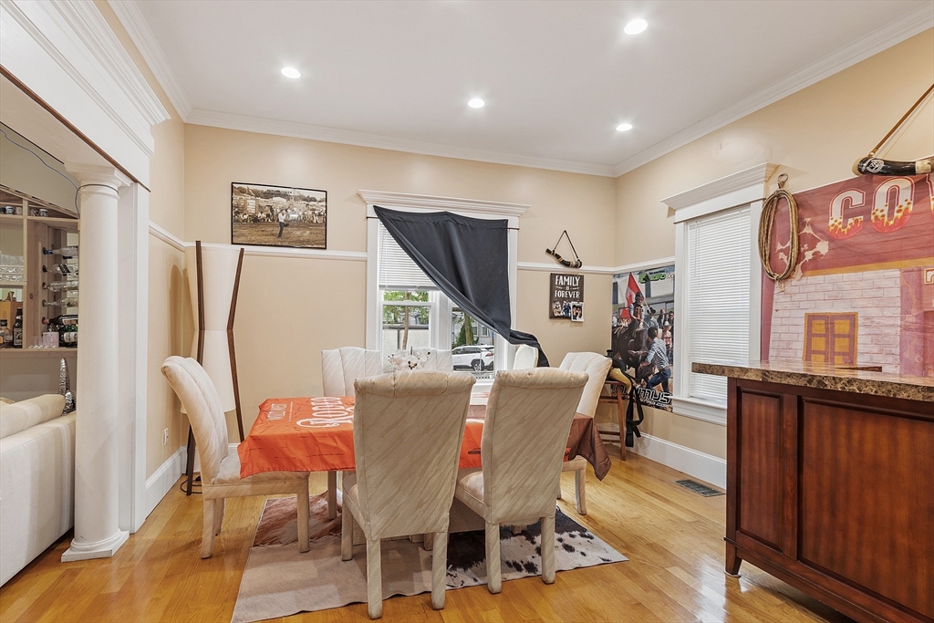 7 Washington Street Somerville, MA 02143 - Photo 7 of 27 a view of a dining room with furniture window and wooden floor