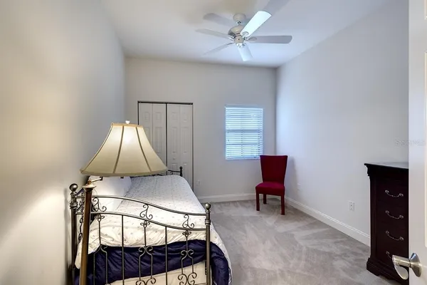 a utility room with cabinets washer and dryer