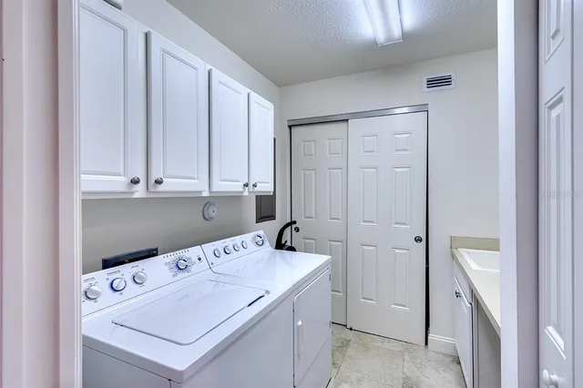 a kitchen with granite countertop lots of counter top space