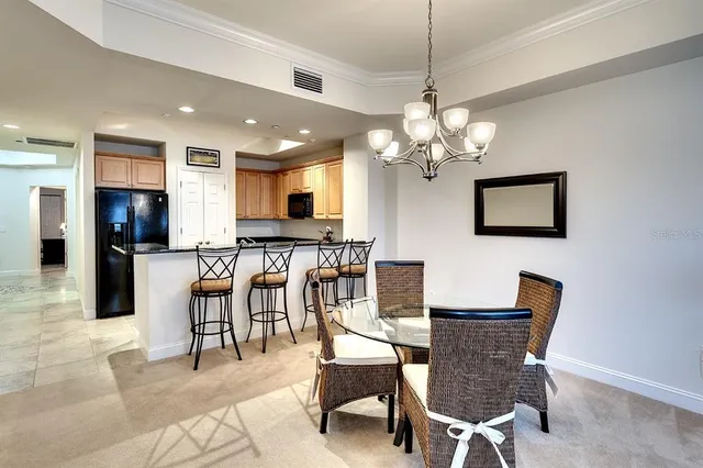 a living room with furniture a rug and a window