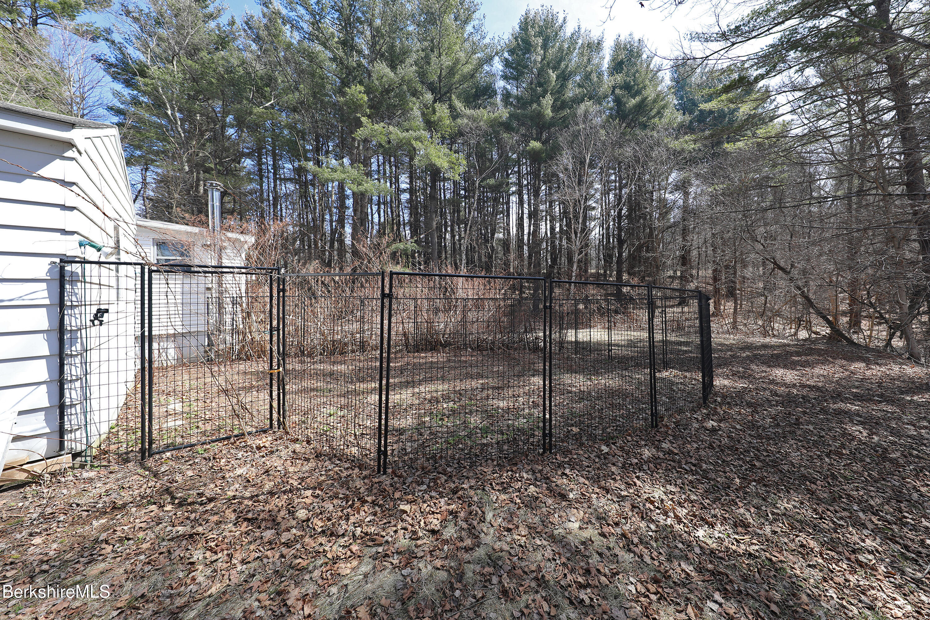 74 Holmes Road Lenox, MA 01240 - Photo 27 of 28 Back lawn; fence owned by Tenants