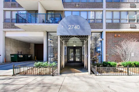 a front view of a building with a glass door