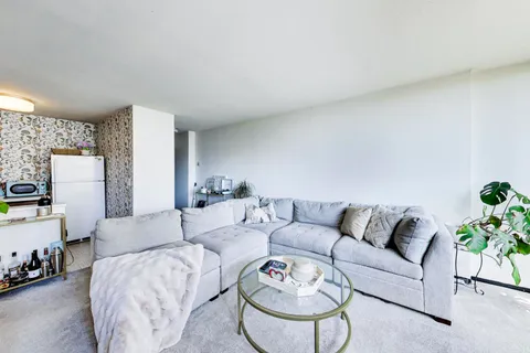 a living room with furniture and a couch