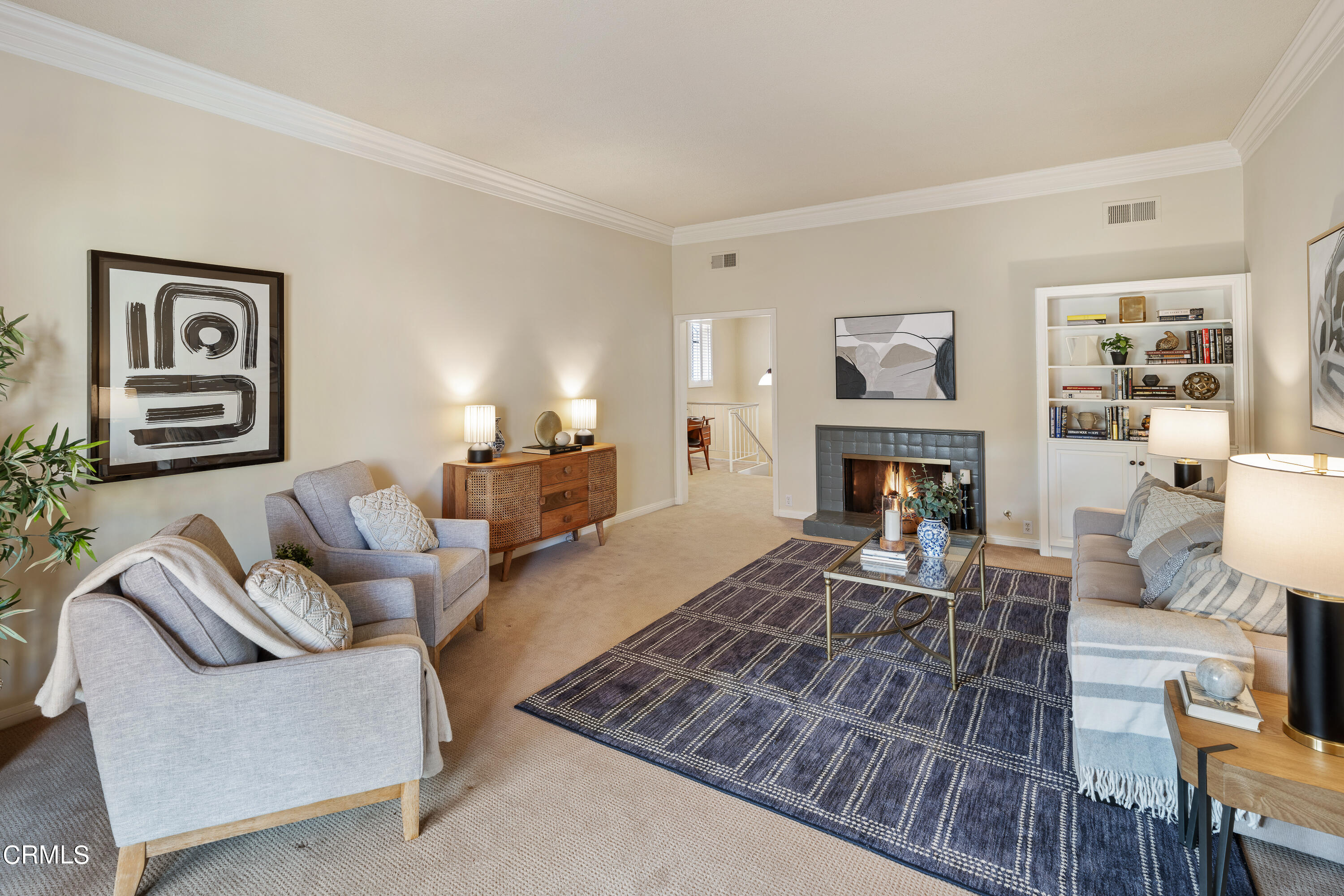 307 Arlington Drive Pasadena, CA 91105 - Photo 12 of 50 a living room with furniture and a fireplace