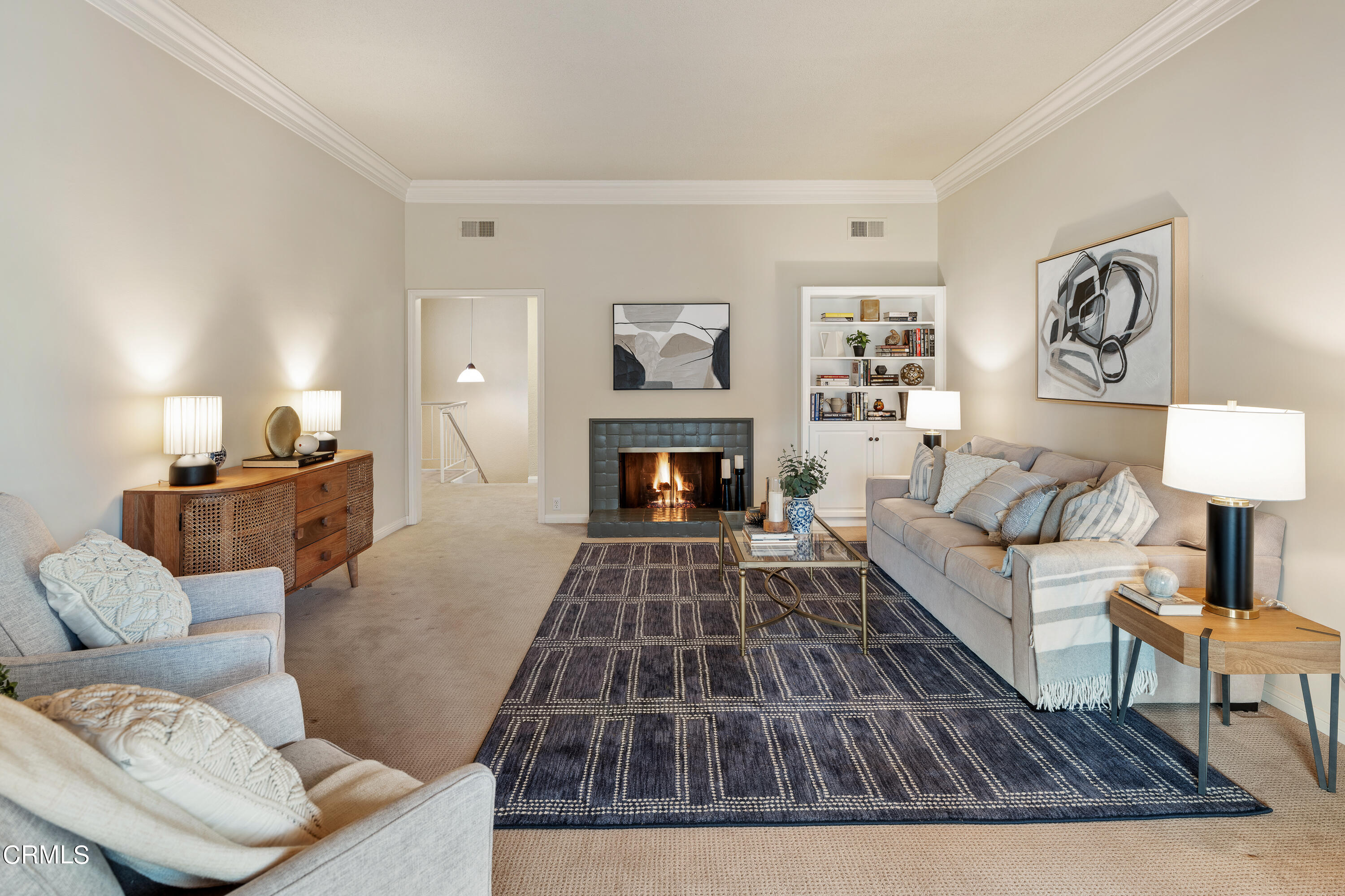 307 Arlington Drive Pasadena, CA 91105 - Photo 13 of 50 a living room with furniture and a fireplace