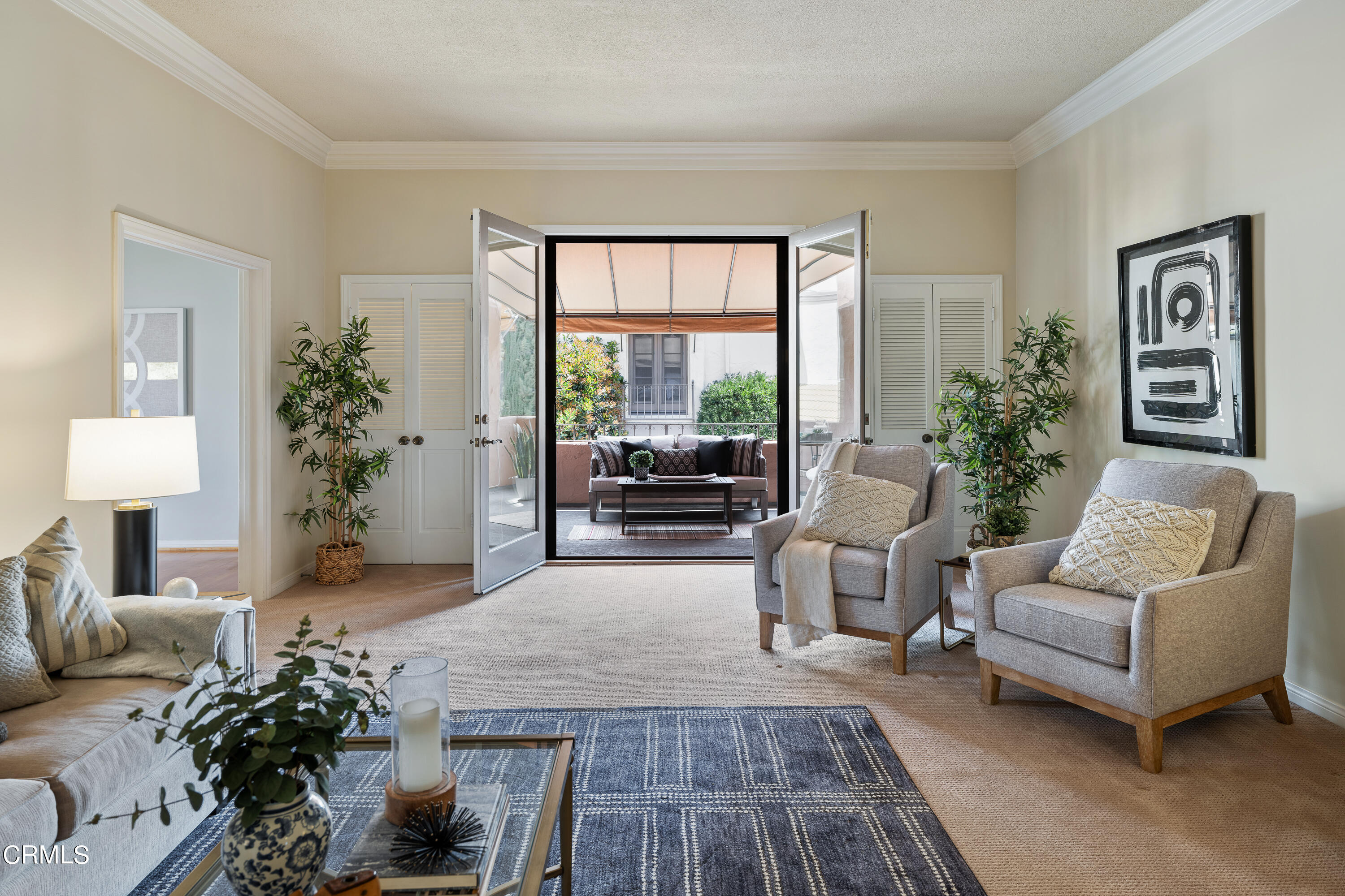 307 Arlington Drive Pasadena, CA 91105 - Photo 17 of 50 a living room with furniture and a large window