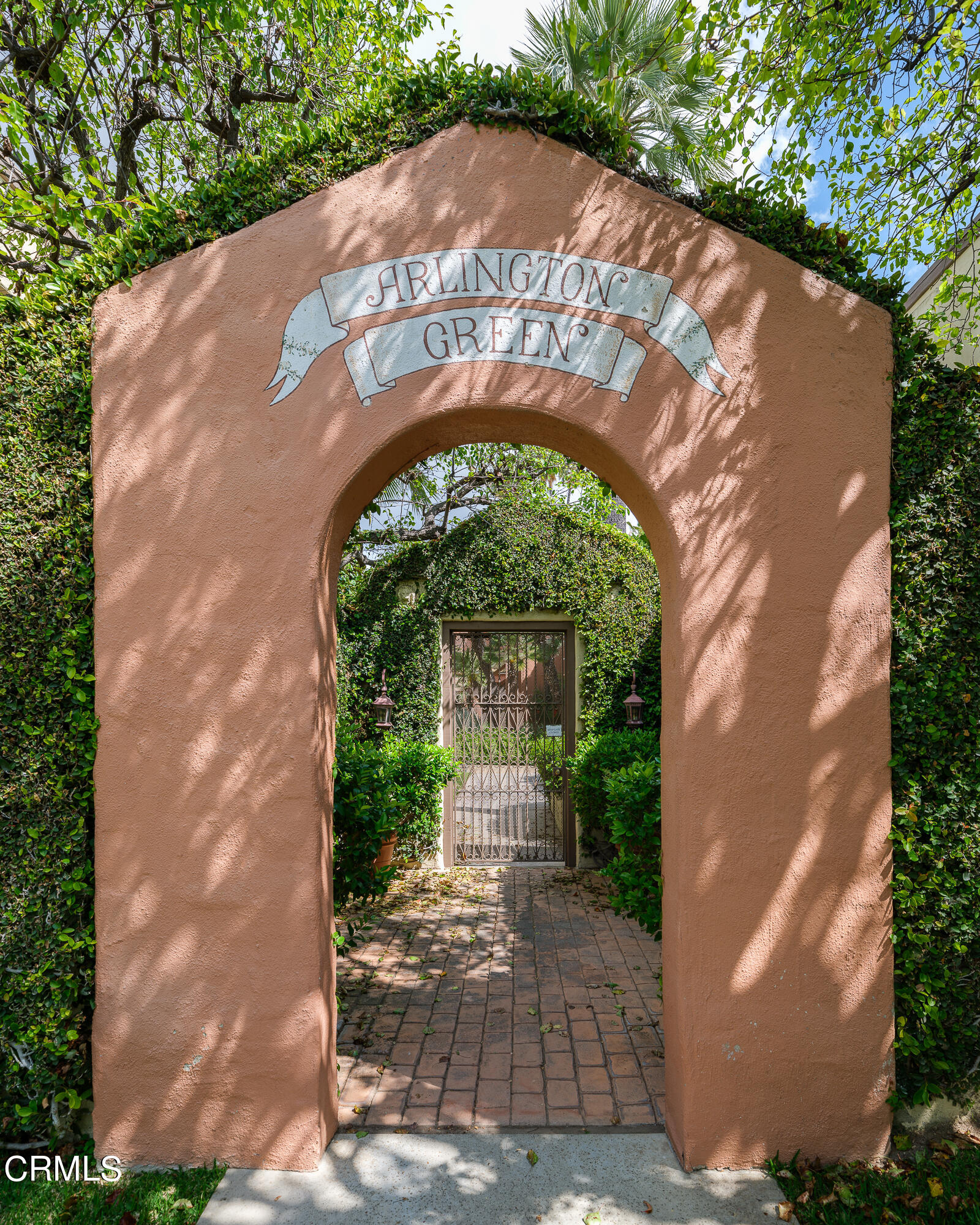 307 Arlington Drive Pasadena, CA 91105 - Photo 2 of 50 a view of a brick house with a small yard