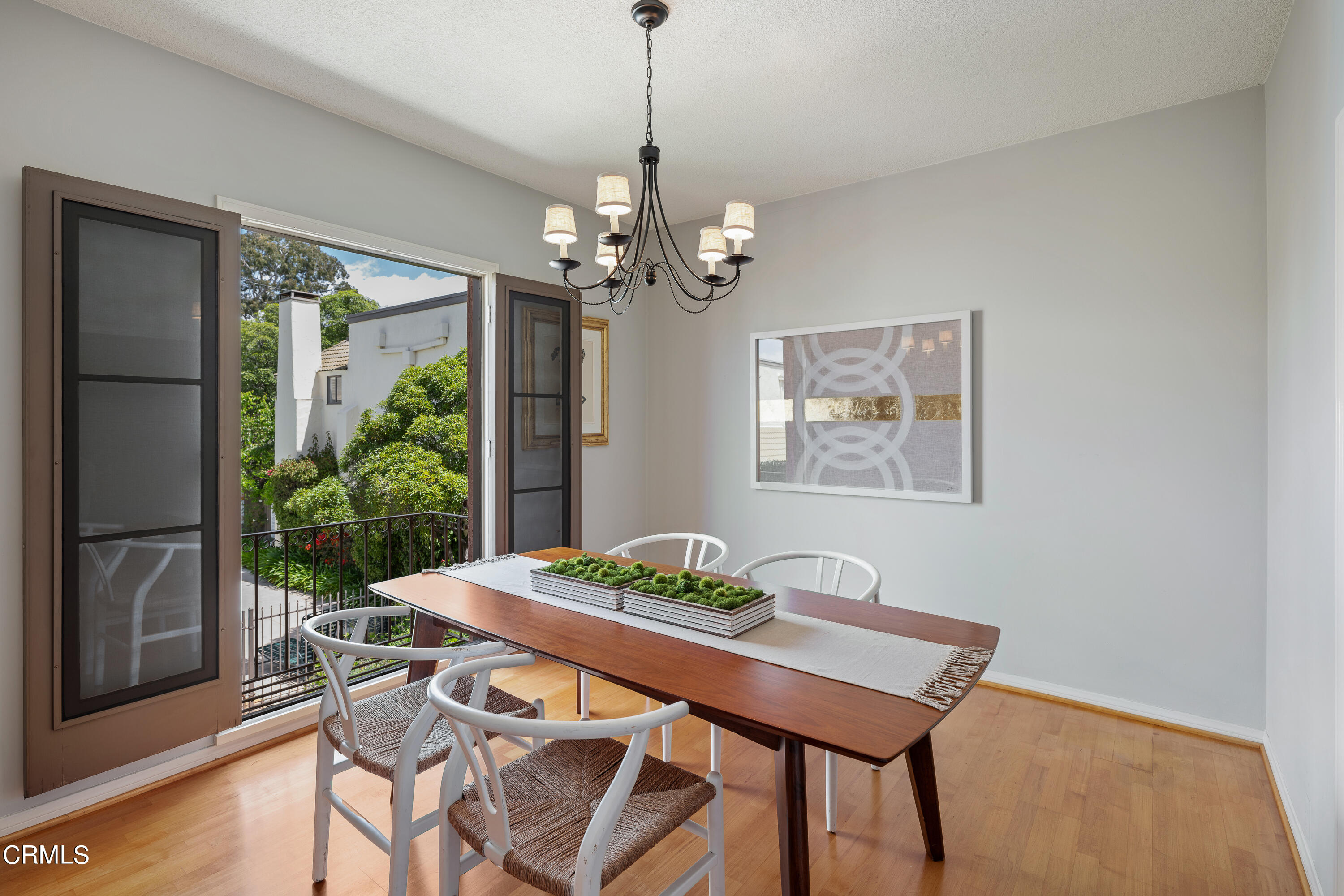 307 Arlington Drive Pasadena, CA 91105 - Photo 25 of 50 a view of a dining room with furniture window and wooden floor