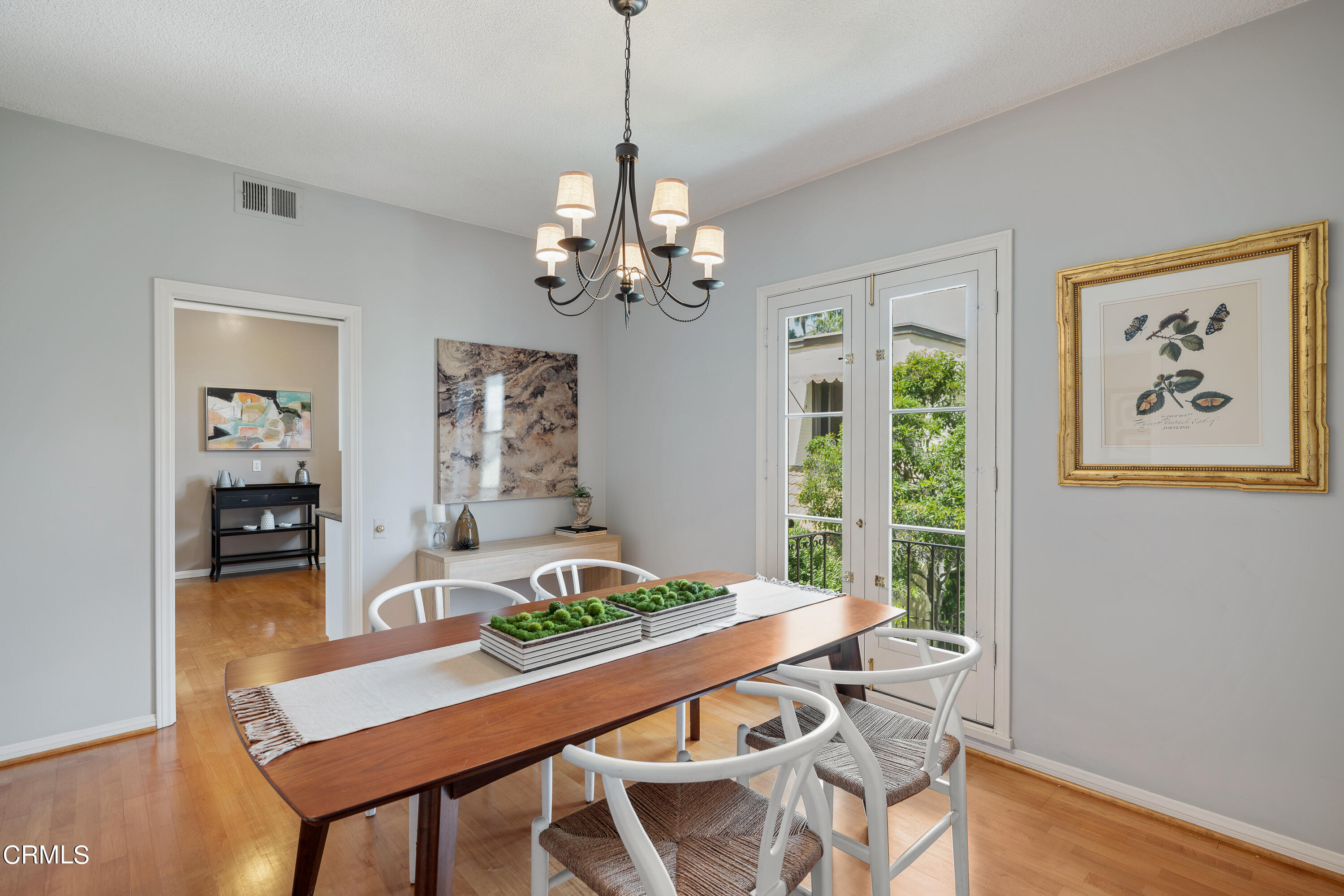 307 Arlington Drive Pasadena, CA 91105 - Photo 26 of 50 a view of a dining room with furniture window and wooden floor