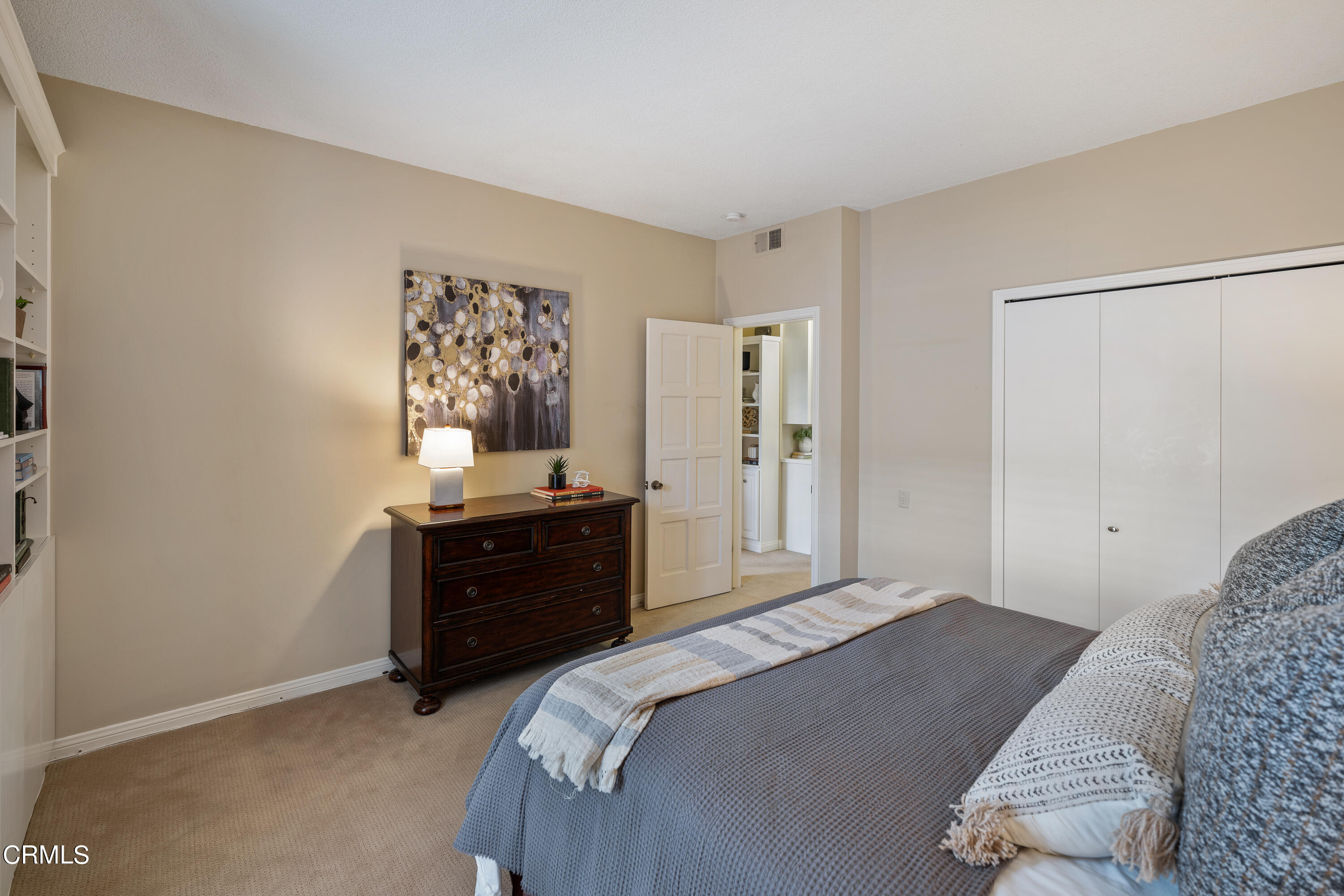 307 Arlington Drive Pasadena, CA 91105 - Photo 32 of 50 a bedroom with a bed and a dresser