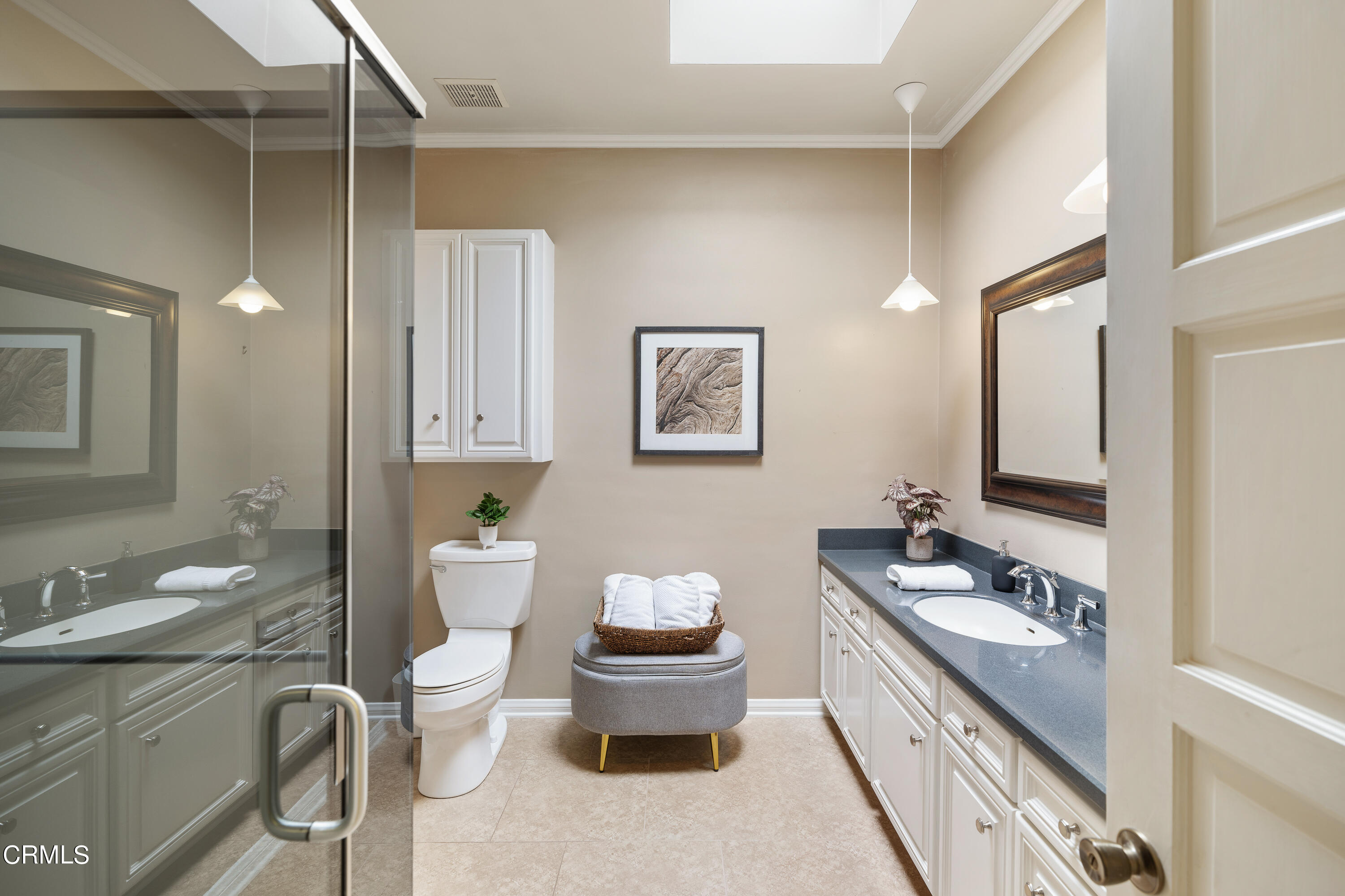 307 Arlington Drive Pasadena, CA 91105 - Photo 33 of 50 a bathroom with a double vanity sink mirror and toilet