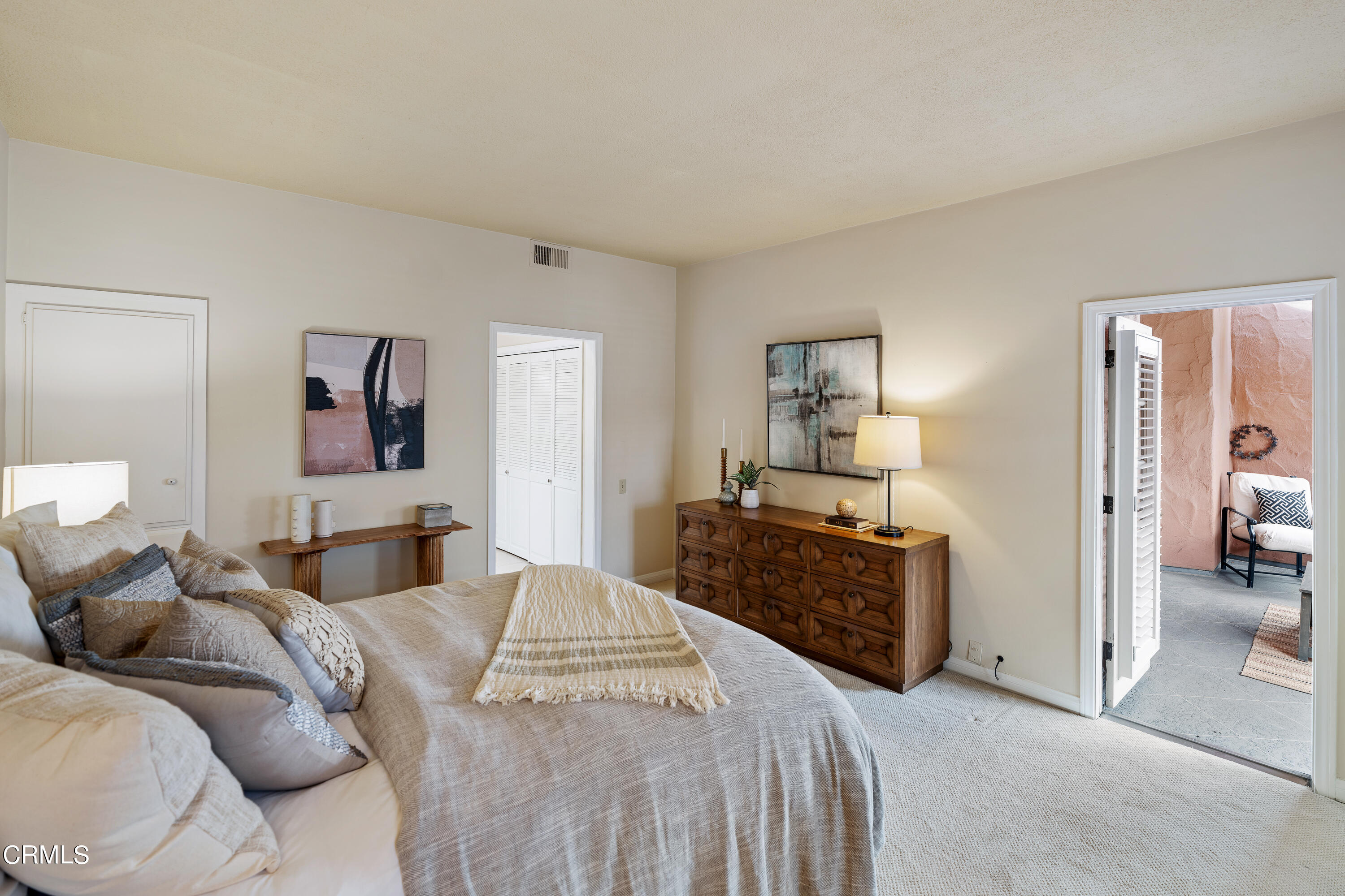 307 Arlington Drive Pasadena, CA 91105 - Photo 42 of 50 a large bedroom with a bed and dresser