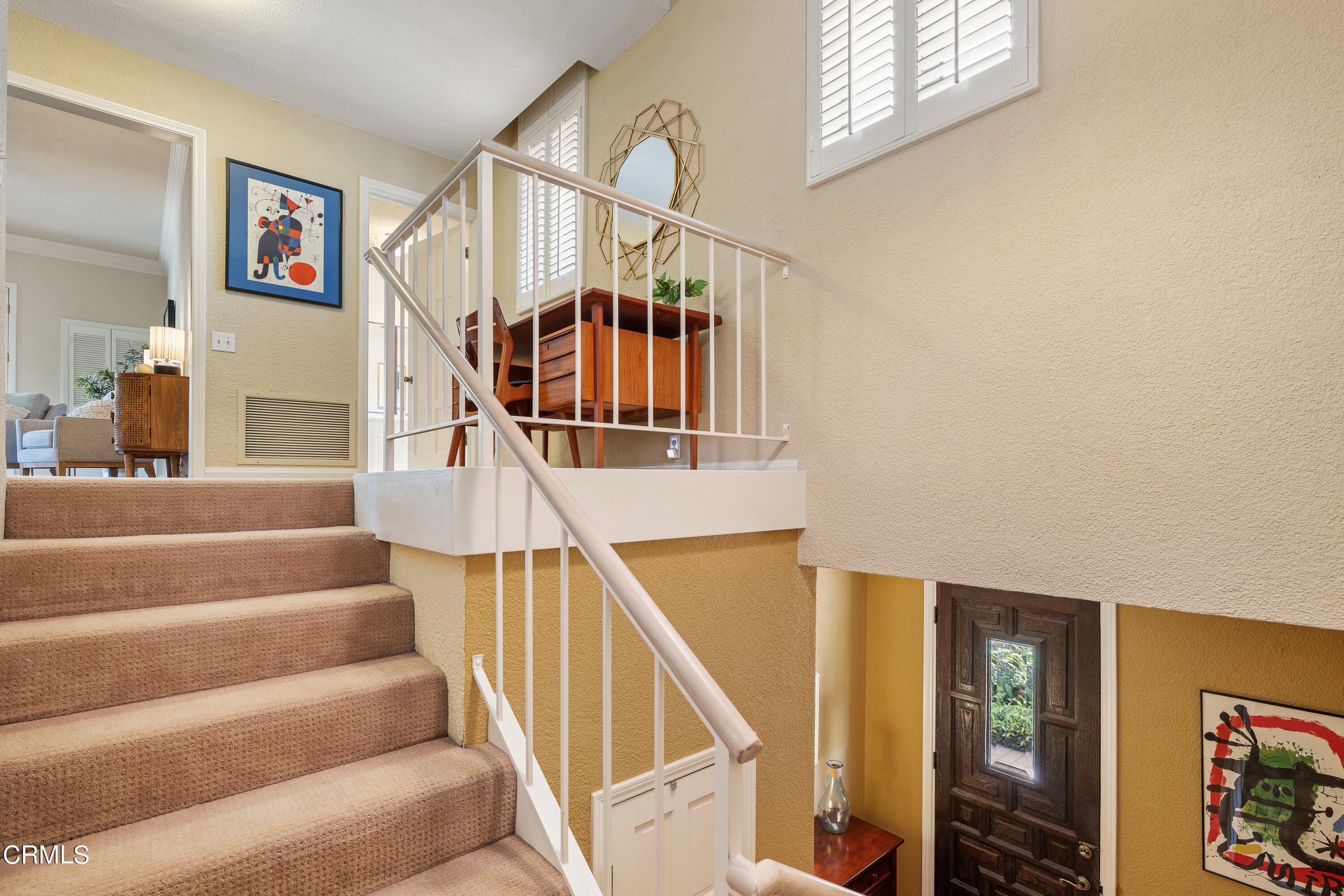 307 Arlington Drive Pasadena, CA 91105 - Photo 9 of 50 a view of entryway and hall with wooden floor