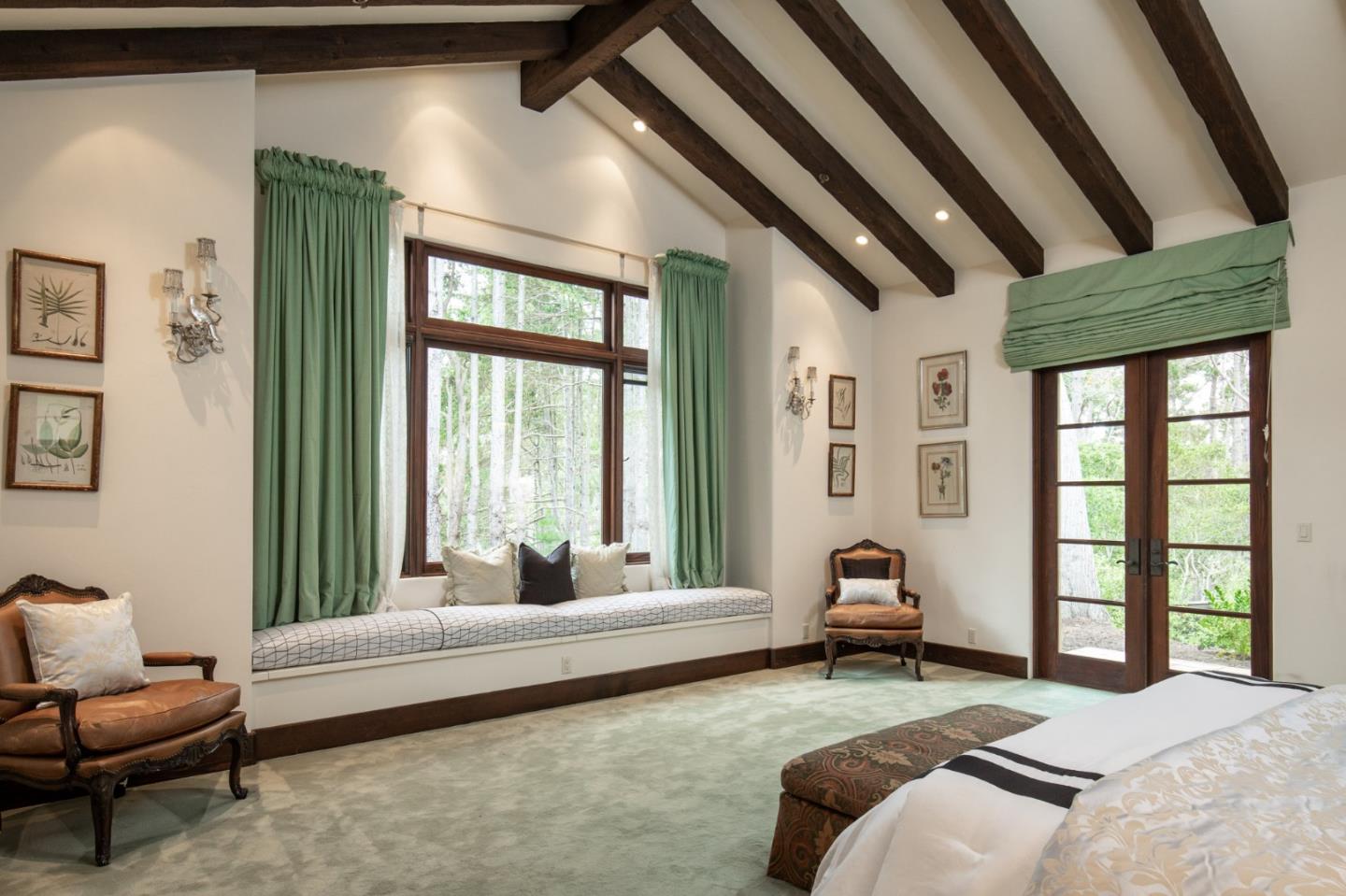 1425 Oleada Road Pebble Beach, CA 93953 - Photo 11 of 26 a bedroom with furniture and a large window