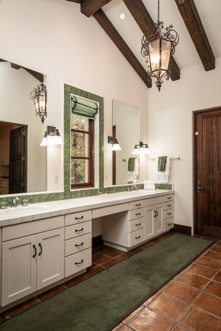 1425 Oleada Road Pebble Beach, CA 93953 - Photo 12 of 26 a large white kitchen with a large window