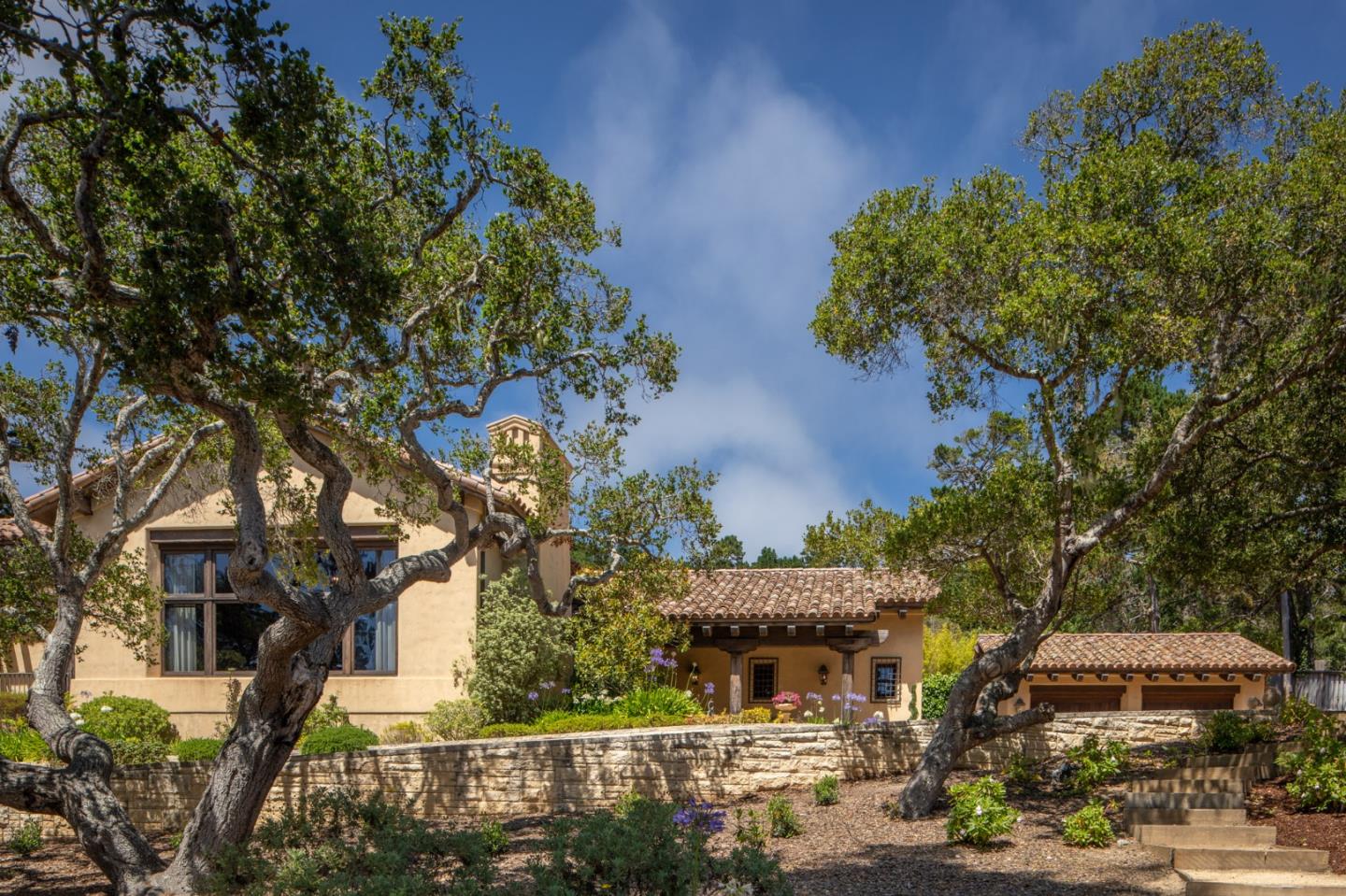 1425 Oleada Road Pebble Beach, CA 93953 - Photo 2 of 26 a view of multiple houses with yard