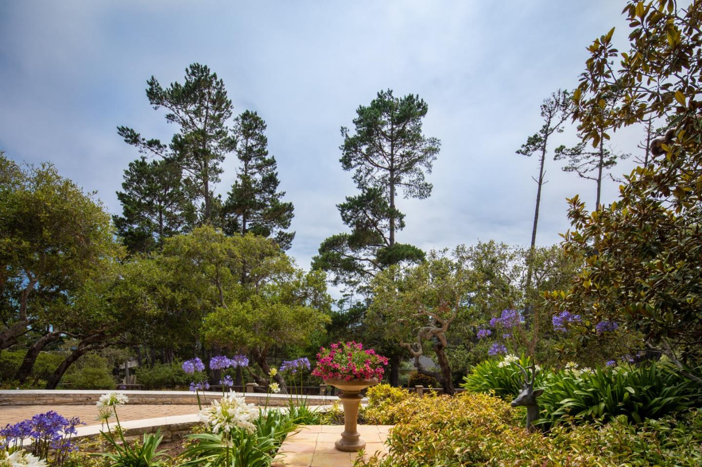 1425 Oleada Road Pebble Beach, CA 93953 - Photo 25 of 26 a view of a swimming pool with a patio