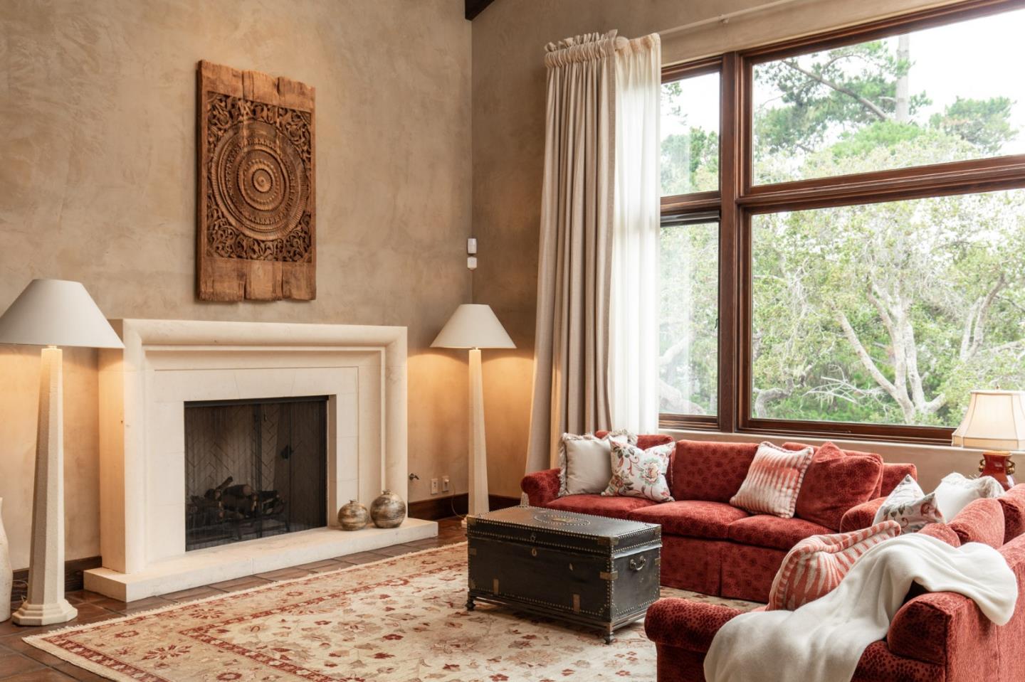 1425 Oleada Road Pebble Beach, CA 93953 - Photo 3 of 26 a living room with furniture and a fireplace