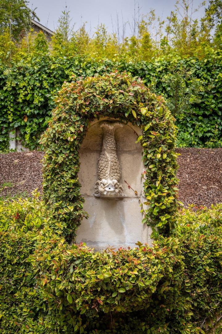 1425 Oleada Road Pebble Beach, CA 93953 - Photo 9 of 26 a view of a garden with a fountain