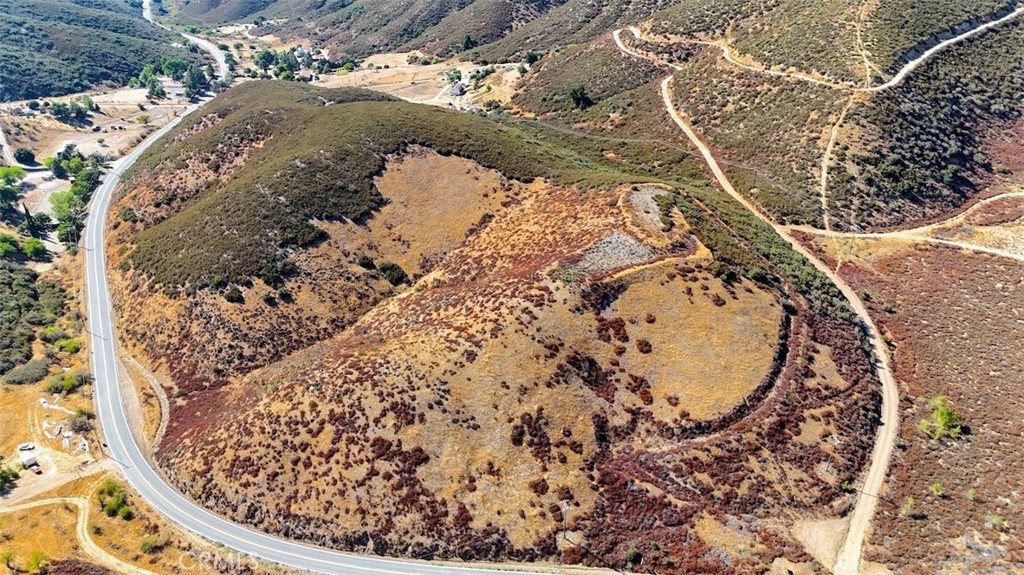 1 Bouquet Canyon Road Santa Clarita, CA 91390 - Photo 22 of 23 a view of water heater and covered with wooden cabinet