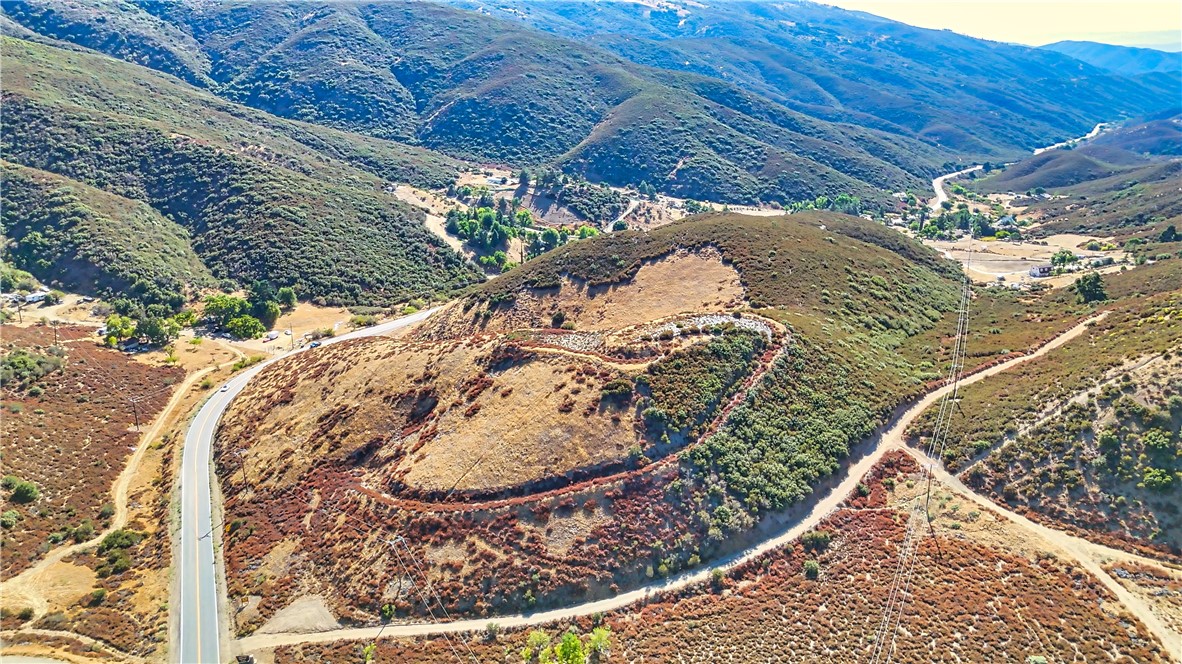 1 Bouquet Canyon Road Santa Clarita, CA 91390 - Photo 5 of 23 a view of a wooden floor with a tree