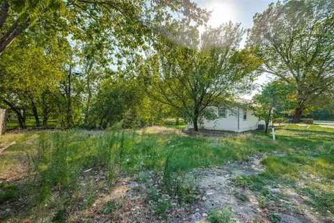 a view of an outdoor space and a yard