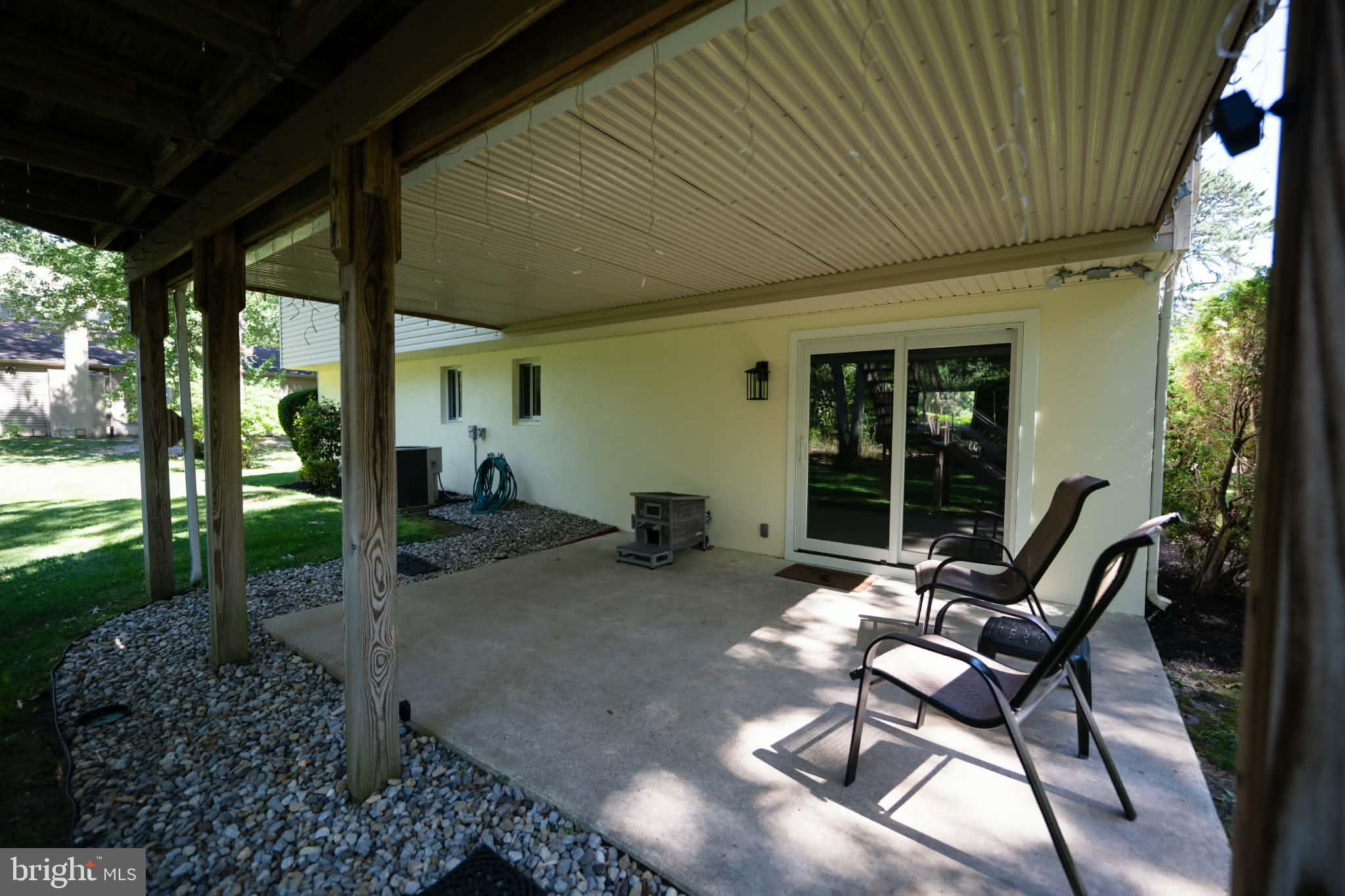 809 Anthony Road Atco, NJ 08004 - Photo 9 of 38 Concrete patio with access to lower family room