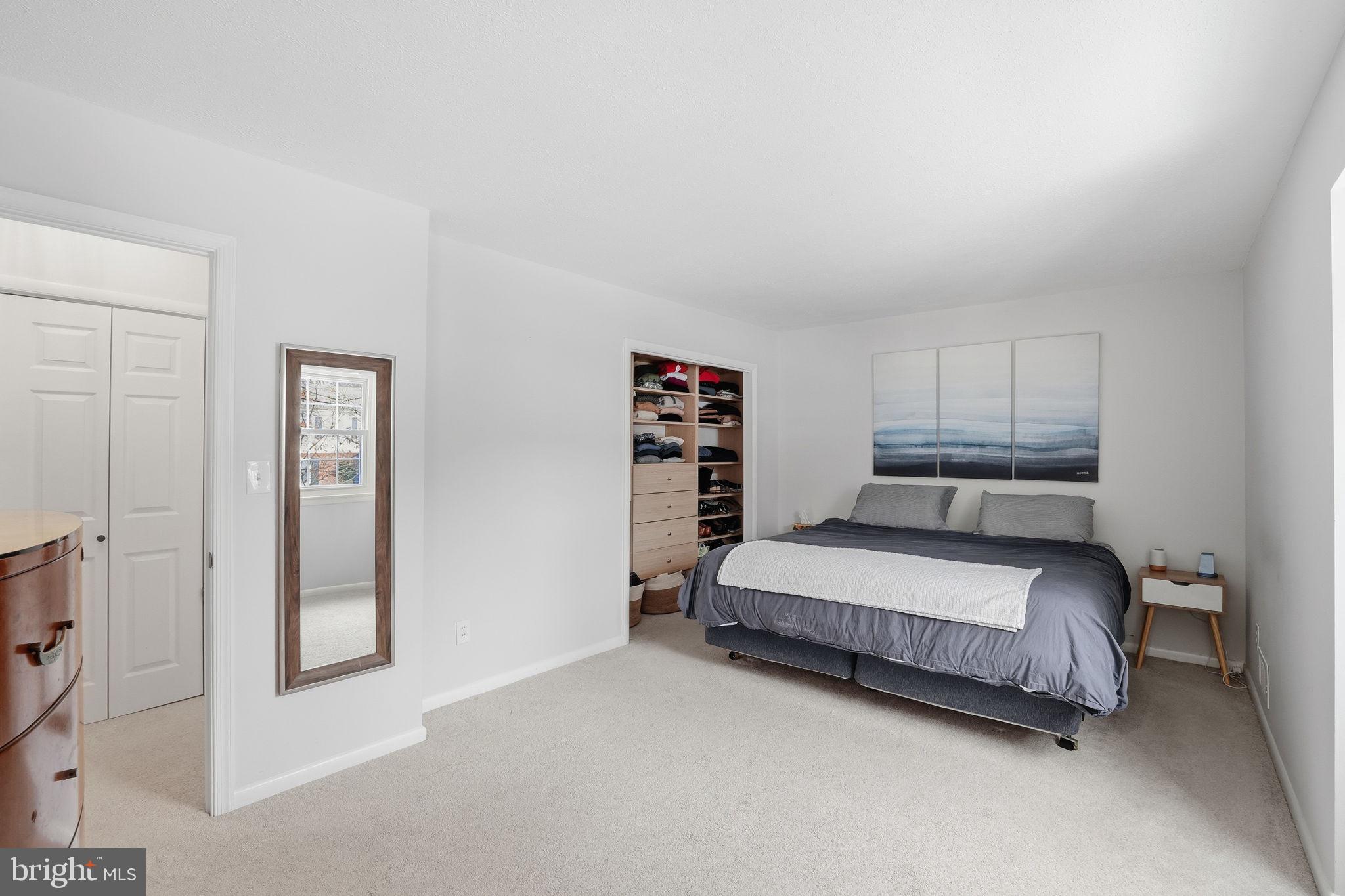 2207 Victor Court Silver Spring, MD 20906 - Photo 17 of 40 a bed room with a bed and a window