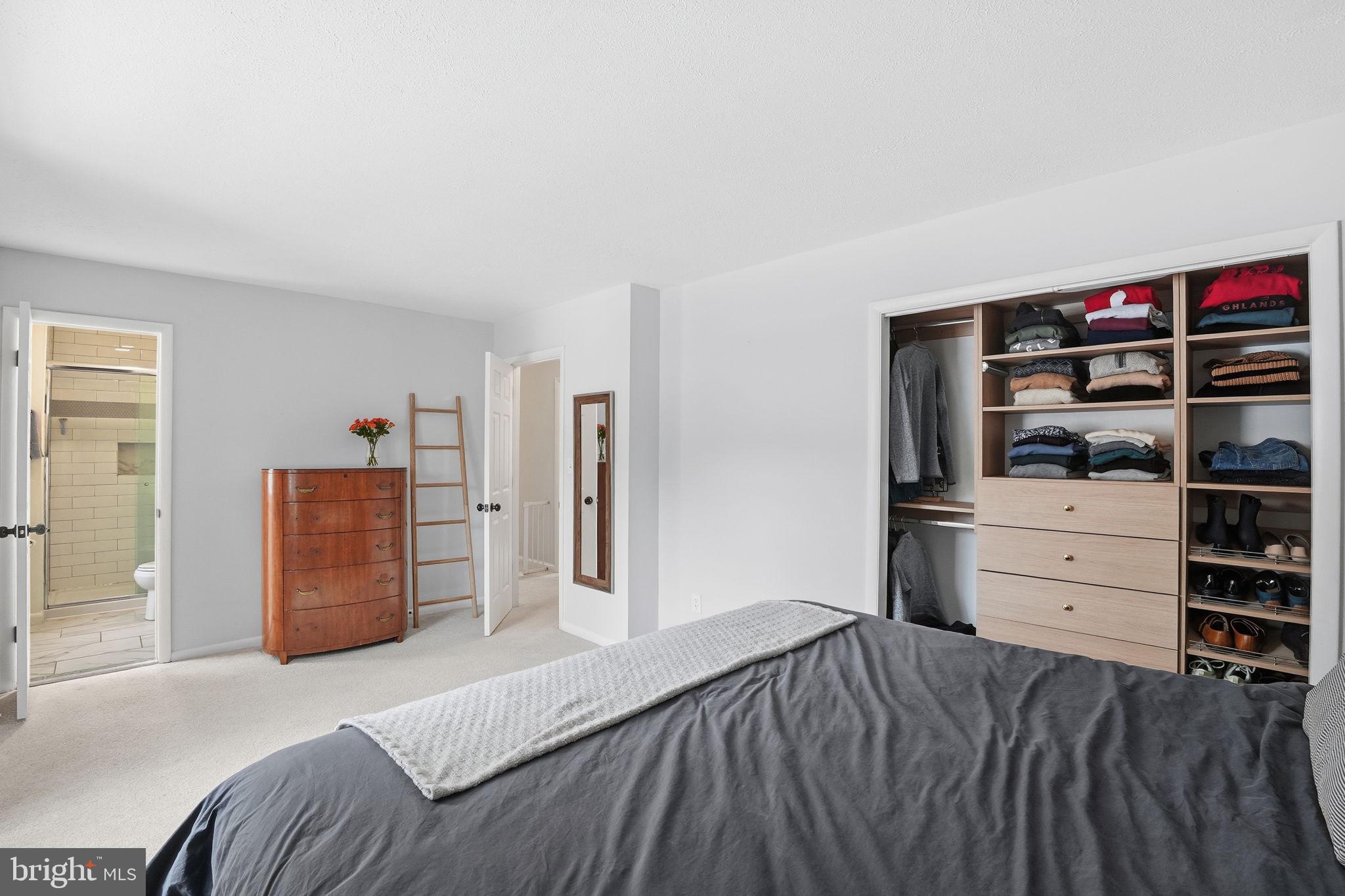 2207 Victor Court Silver Spring, MD 20906 - Photo 18 of 40 a bedroom with a bed and furniture