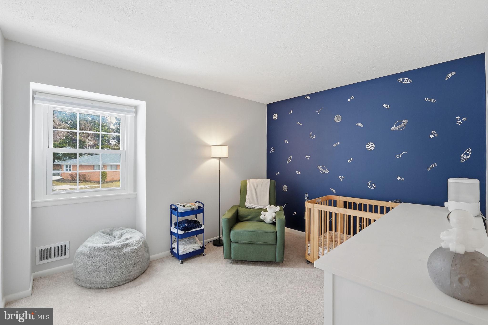 2207 Victor Court Silver Spring, MD 20906 - Photo 21 of 40 a hallway with a dresser and a couch