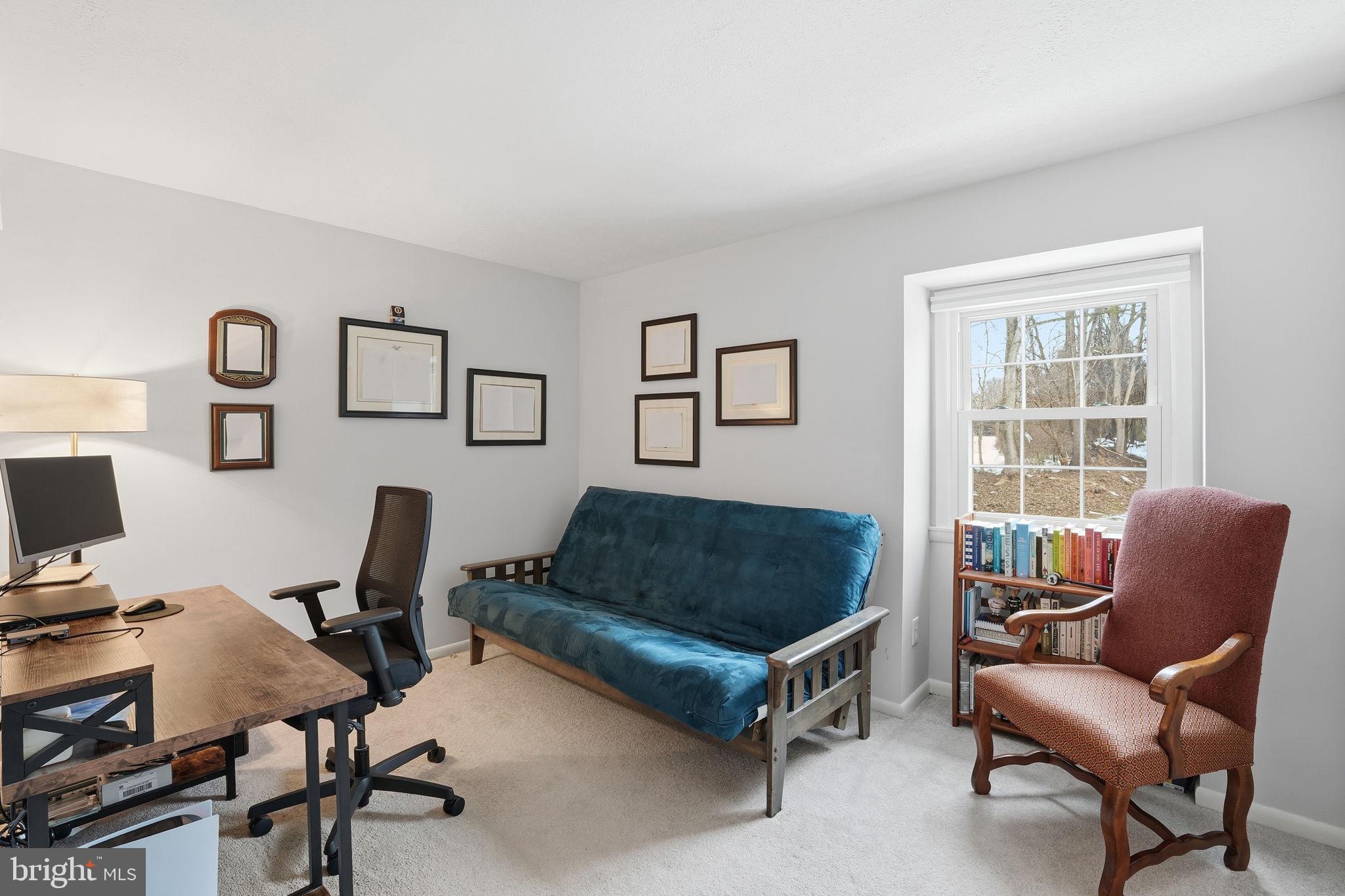 2207 Victor Court Silver Spring, MD 20906 - Photo 25 of 40 a living room with furniture and a window