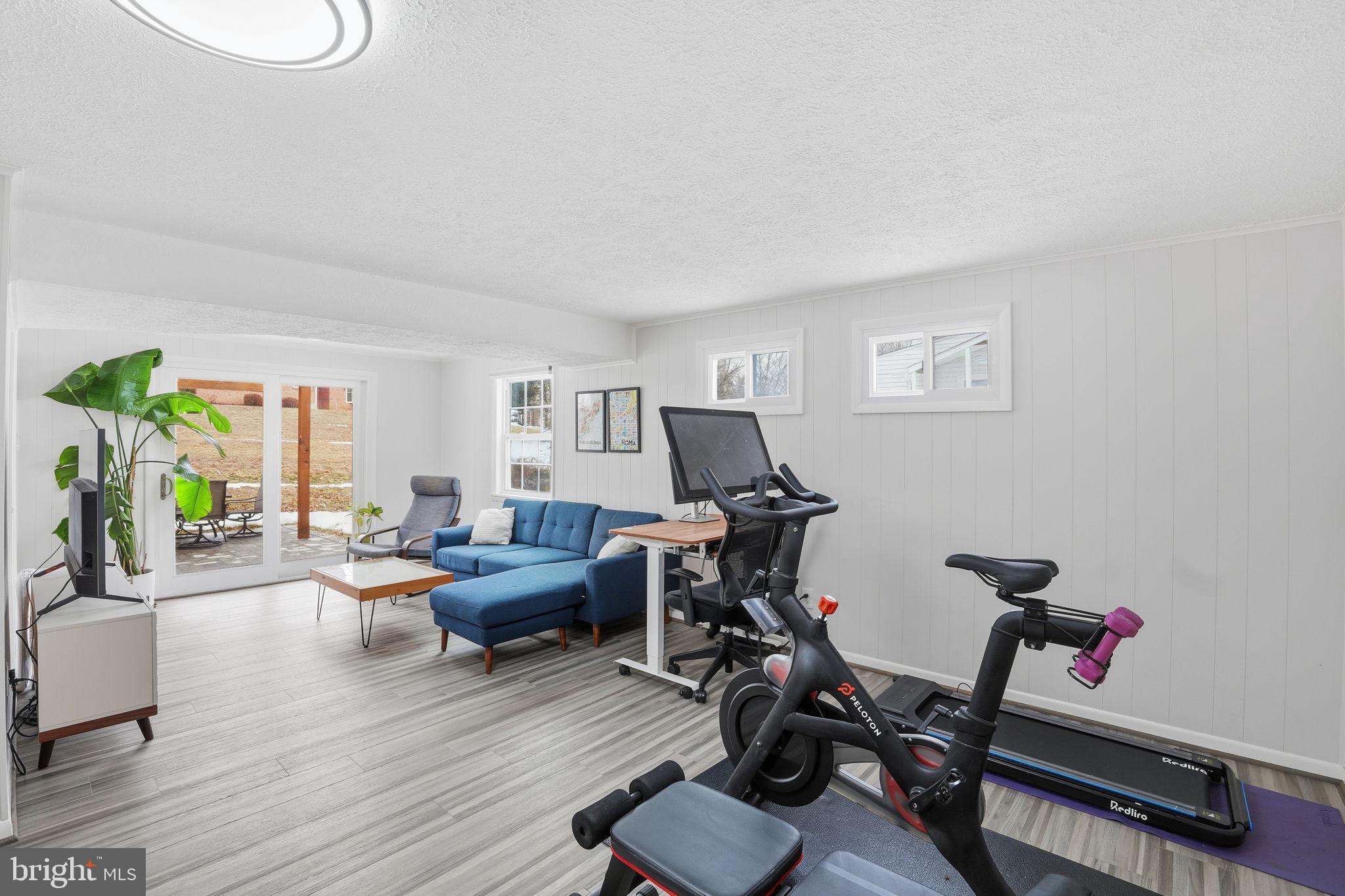 2207 Victor Court Silver Spring, MD 20906 - Photo 27 of 40 a living room with furniture and a wooden floor