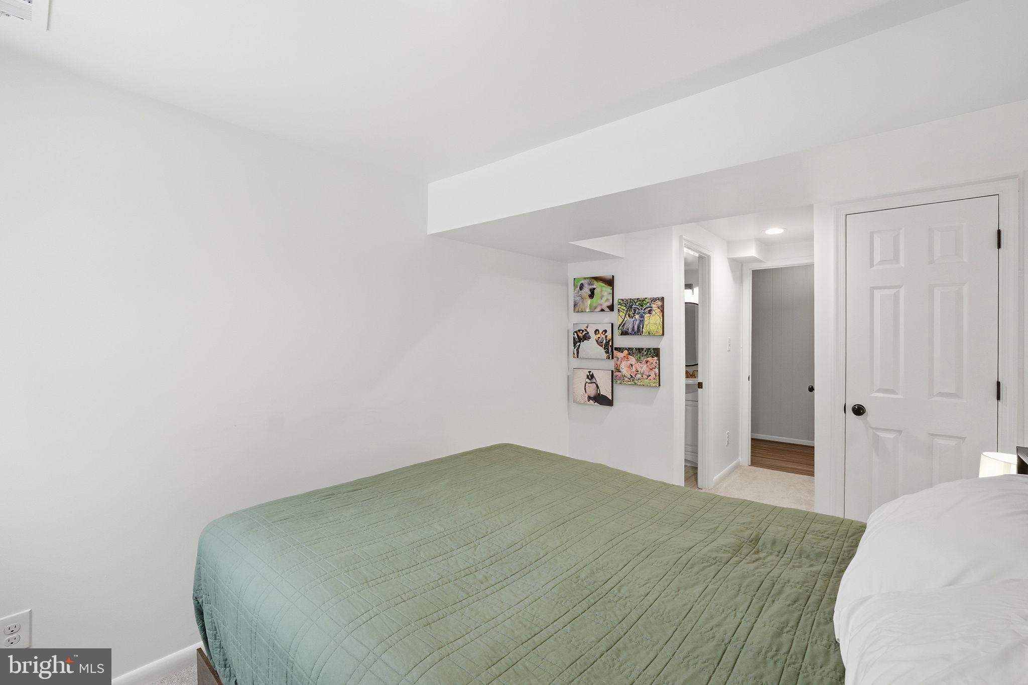 2207 Victor Court Silver Spring, MD 20906 - Photo 32 of 40 a bedroom with a bed and closet