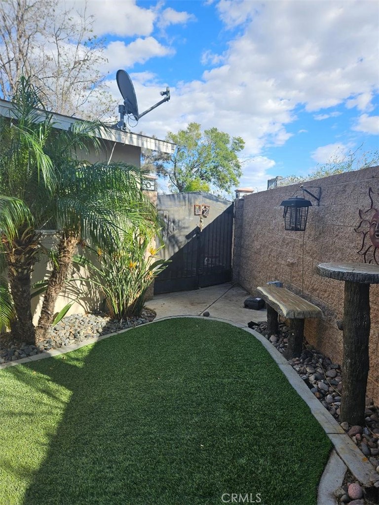 19263 Easton Street Rialto, CA 92376 - Photo 11 of 16 a view of a backyard with plants