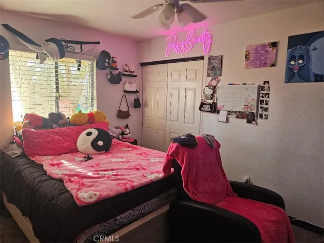 a bed room with a bed and a couch