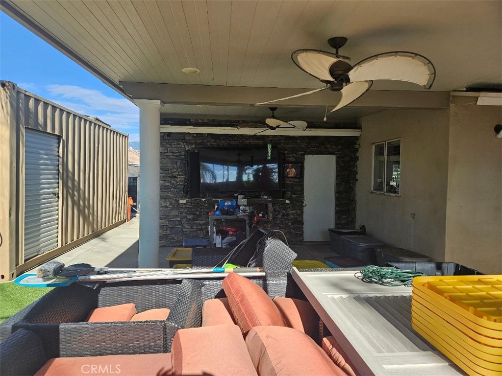 19263 Easton Street Rialto, CA 92376 - Photo 10 of 16 a living room with furniture and a rug