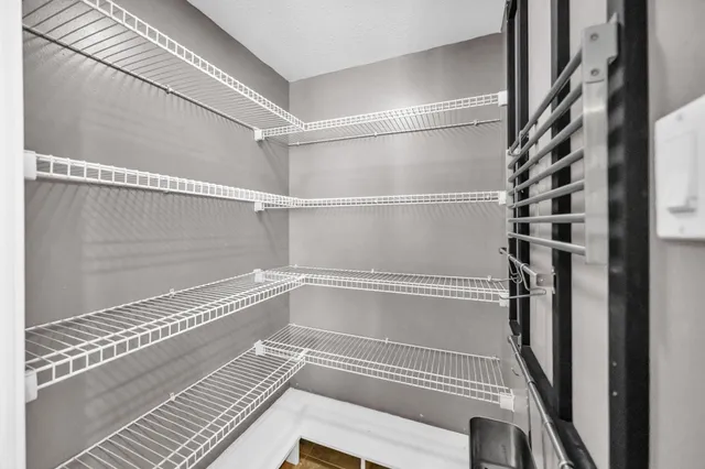 a view of a porch with wooden floor