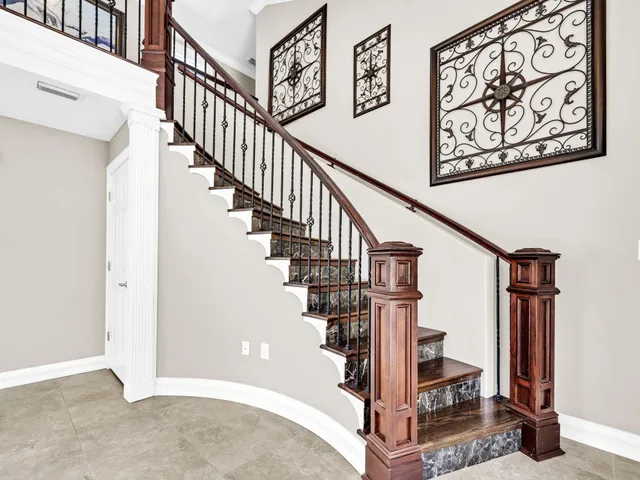 a view of an empty room with a fireplace
