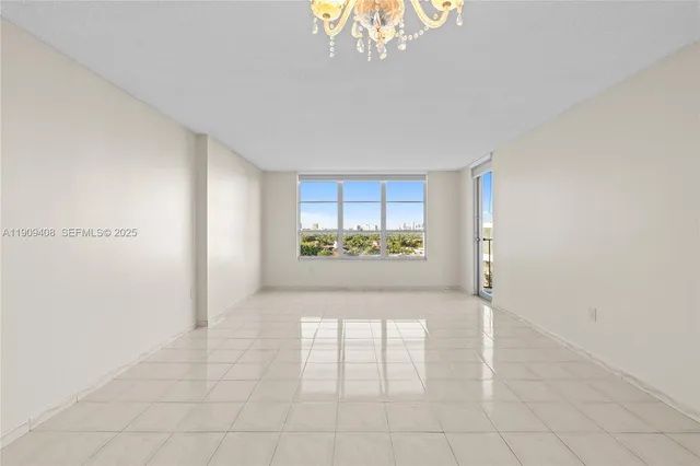 a view of an empty room and window