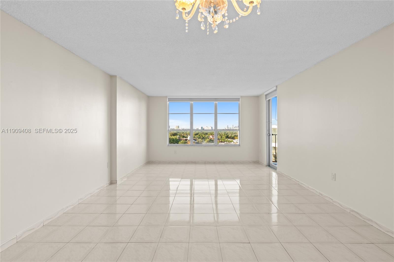 4101 Pine Tree Drive, Unit 802 Miami Beach, FL 33140 - Photo 1 of 58 a view of an empty room and window