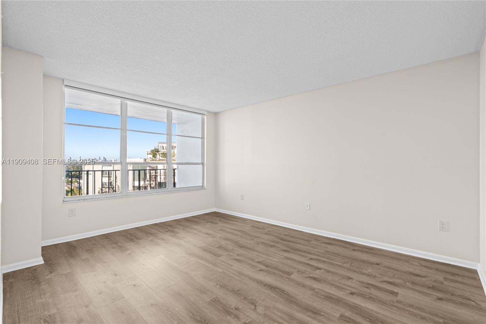 4101 Pine Tree Drive, Unit 802 Miami Beach, FL 33140 - Photo 23 of 58 a view of an empty room with a window