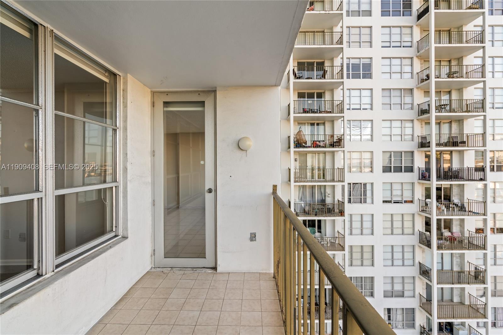 4101 Pine Tree Drive, Unit 802 Miami Beach, FL 33140 - Photo 28 of 58 a view of a tall building from the balcony