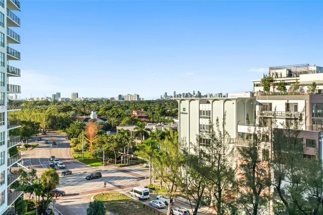 a view of a livingroom with furniture and staircase