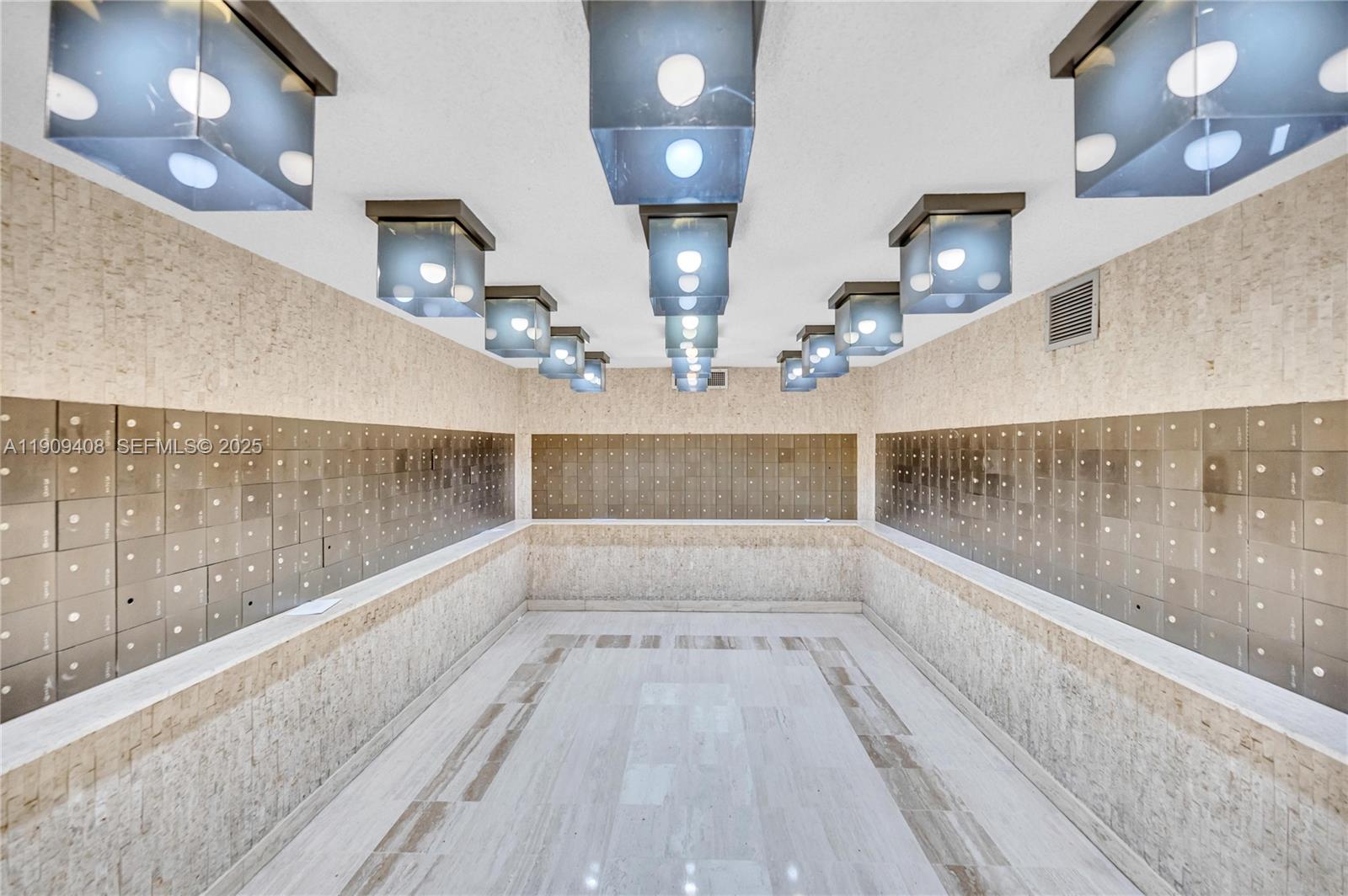 4101 Pine Tree Drive, Unit 802 Miami Beach, FL 33140 - Photo 41 of 58 a view of kitchen and living room with wooden floor