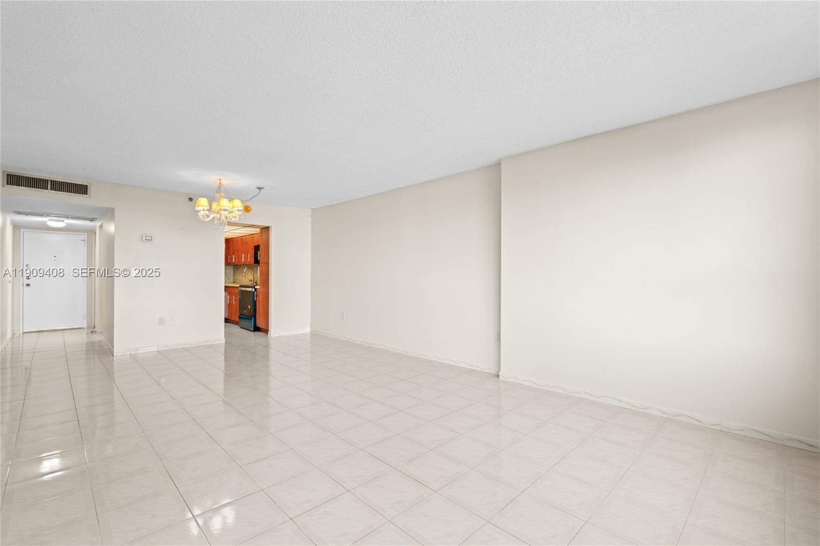 4101 Pine Tree Drive, Unit 802 Miami Beach, FL 33140 - Photo 7 of 58 wooden floor in an empty room