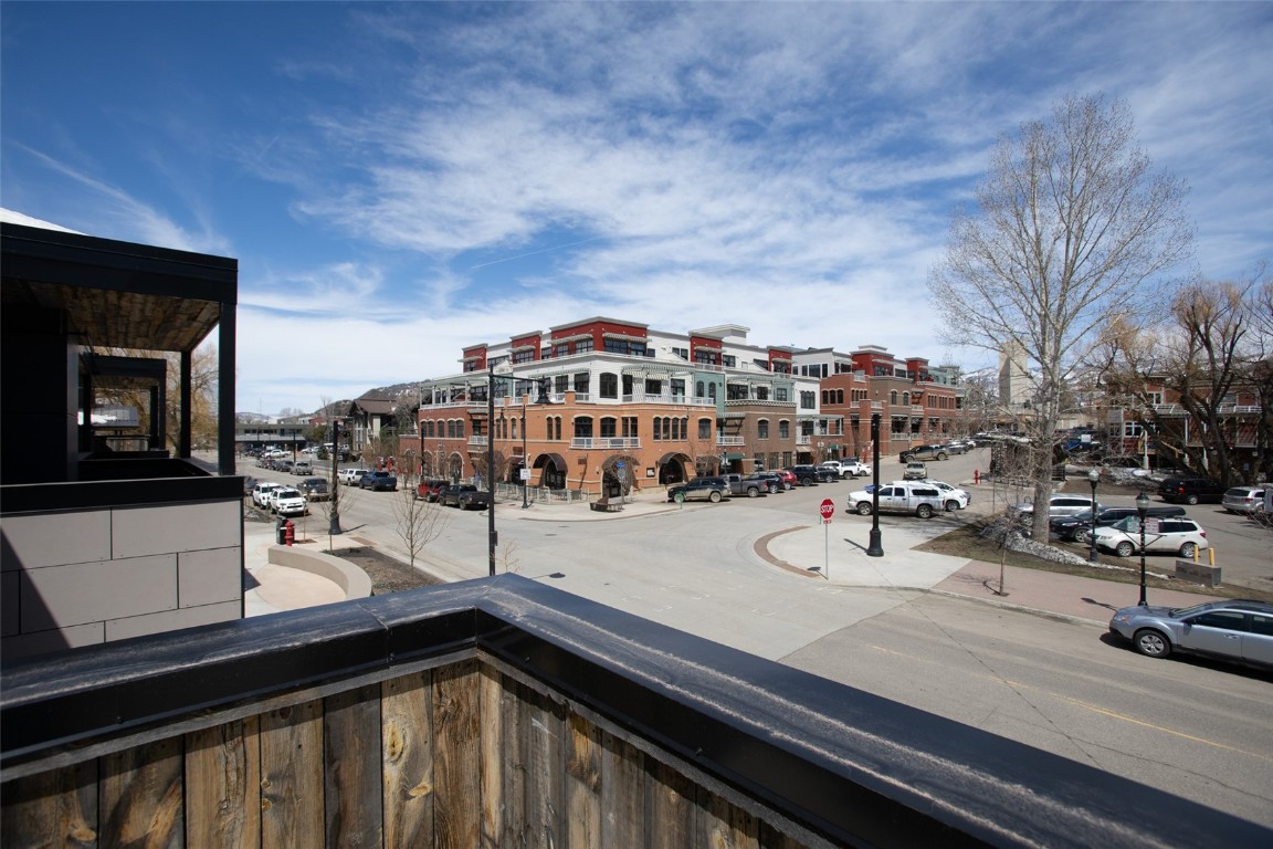 655 Yampa Street, Unit R1 Steamboat Springs, CO 80487 - Photo 19 of 49 a view of a city from a balcony
