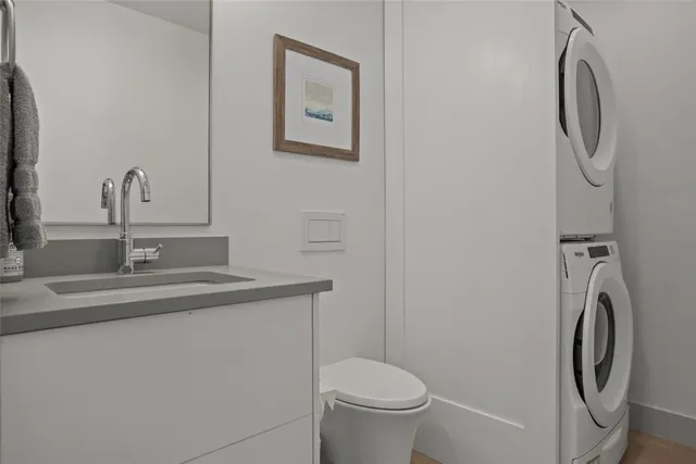 a view of staircase with washer and dryer