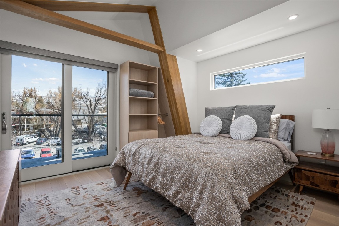 655 Yampa Street, Unit R1 Steamboat Springs, CO 80487 - Photo 40 of 49 a bedroom with a large bed and a window