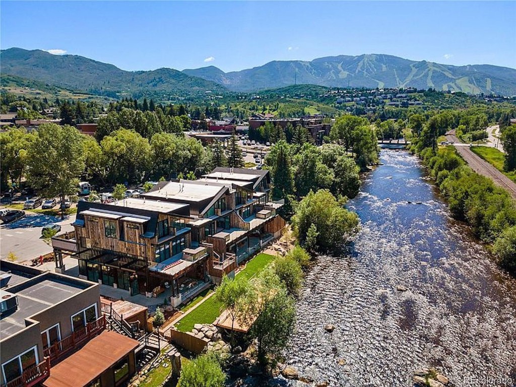 655 Yampa Street, Unit R1 Steamboat Springs, CO 80487 - Photo 44 of 49 an aerial view of residential house and mountain view