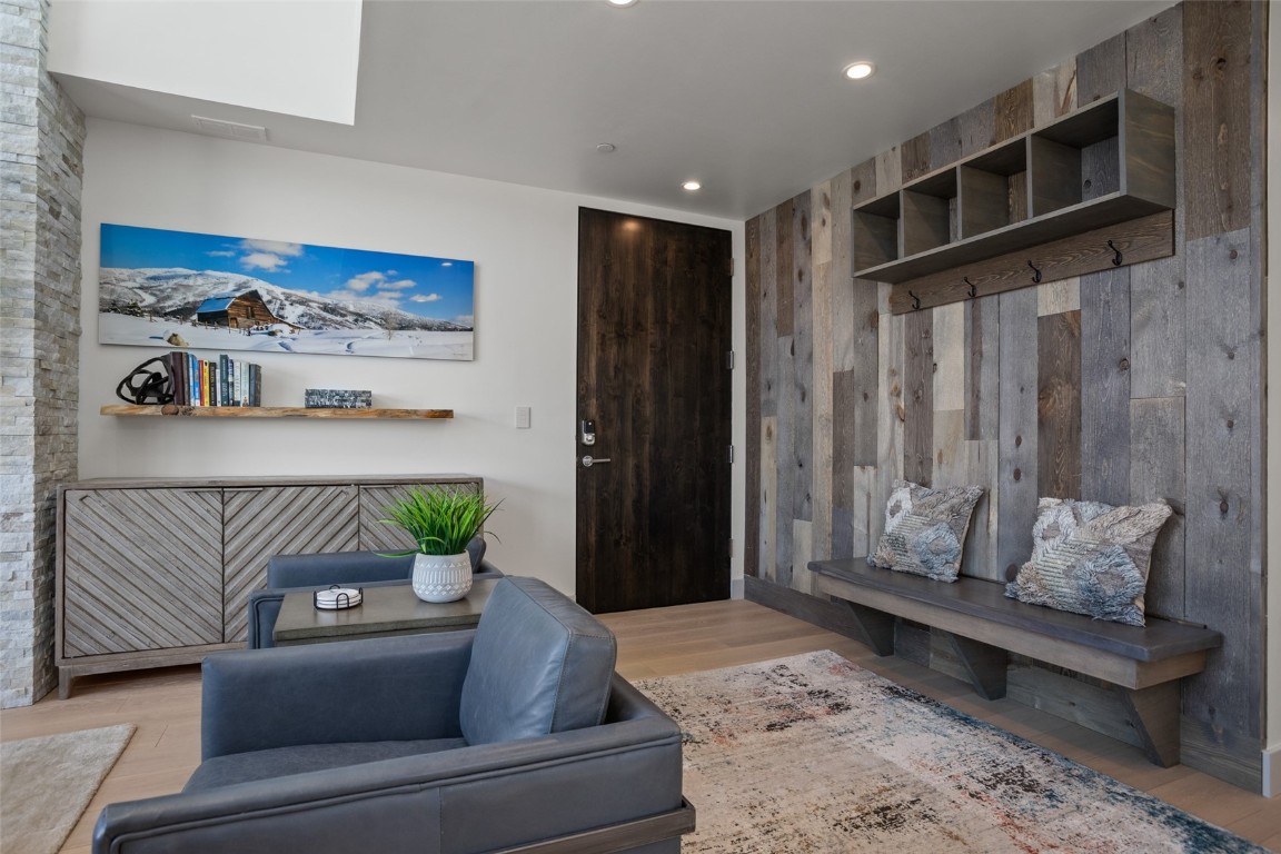 655 Yampa Street, Unit R1 Steamboat Springs, CO 80487 - Photo 5 of 49 a living room with furniture and a couch
